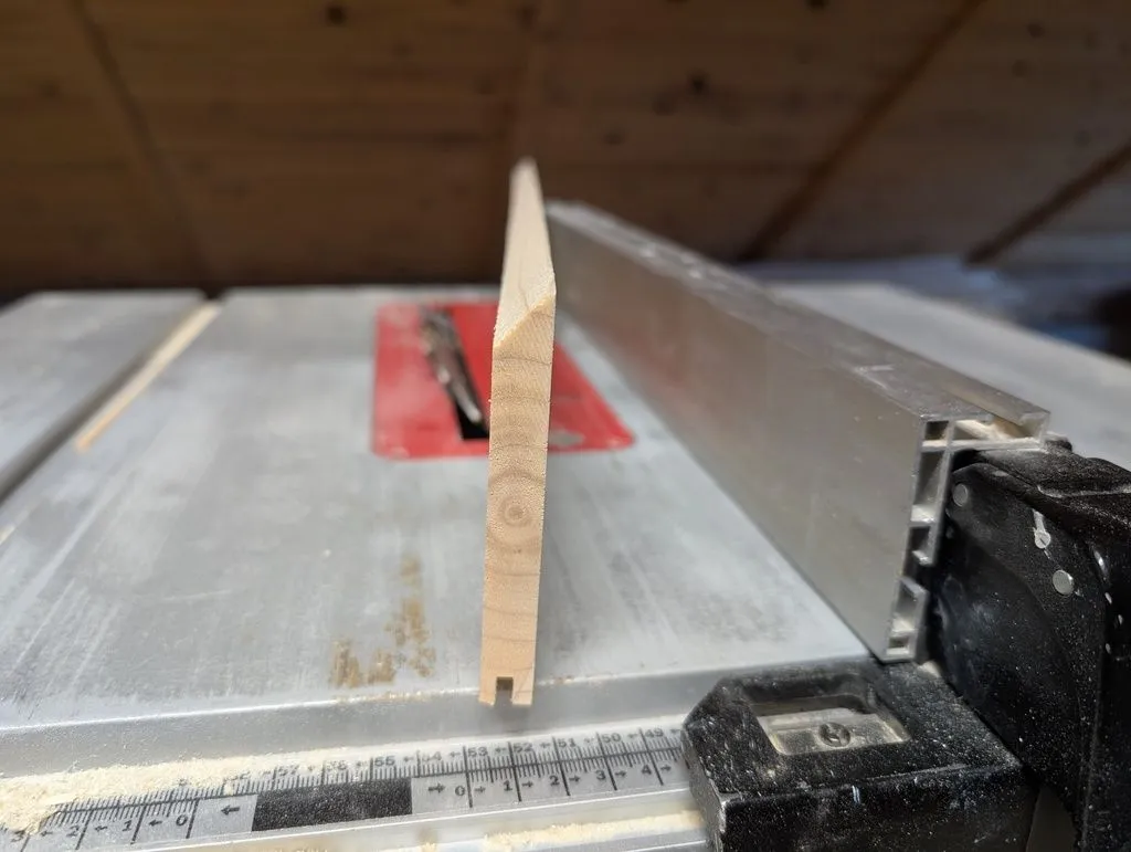 On the way to a curved edge—the temporary beveled edge made on the table saw.