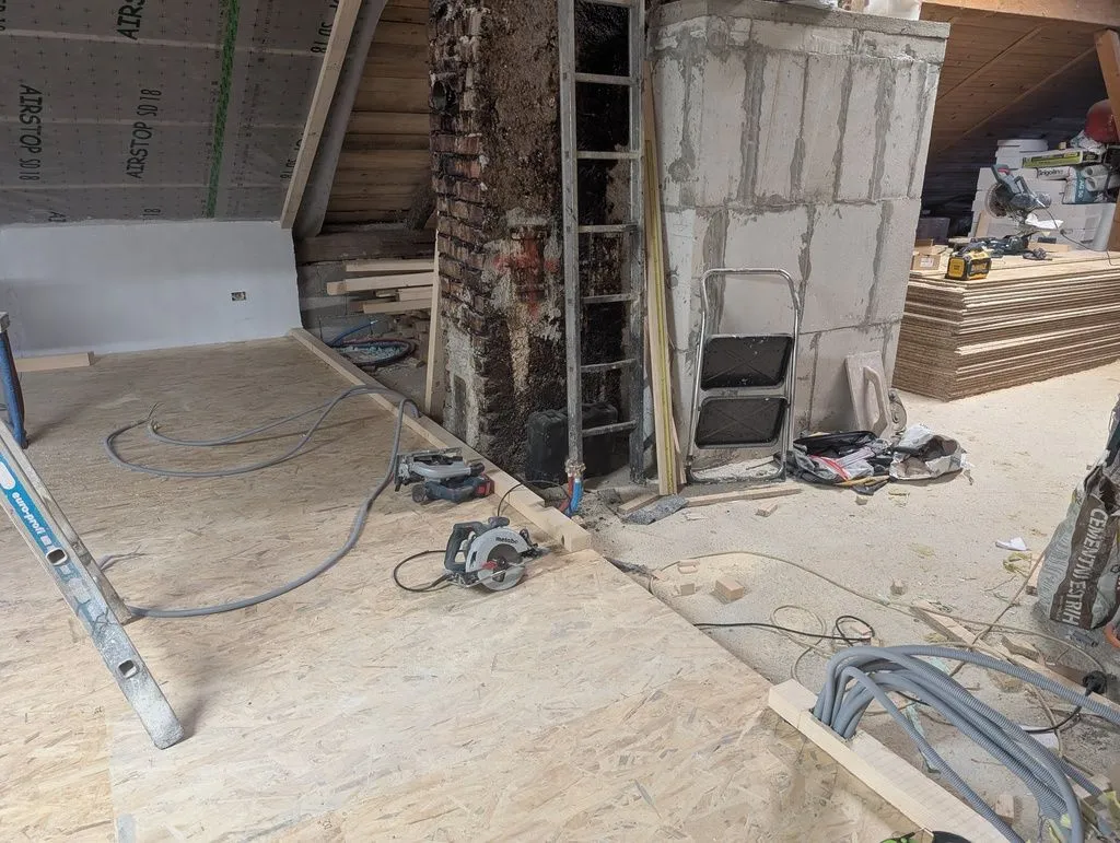 Installing the top and bottom plates (the bottom plate is notched to allow conduit to come up into the wall).