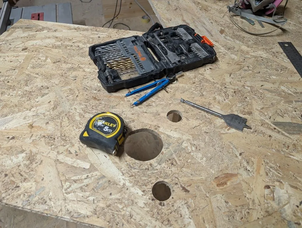 We drilled holes in the OSB sheathing to fit over plumbing lines.