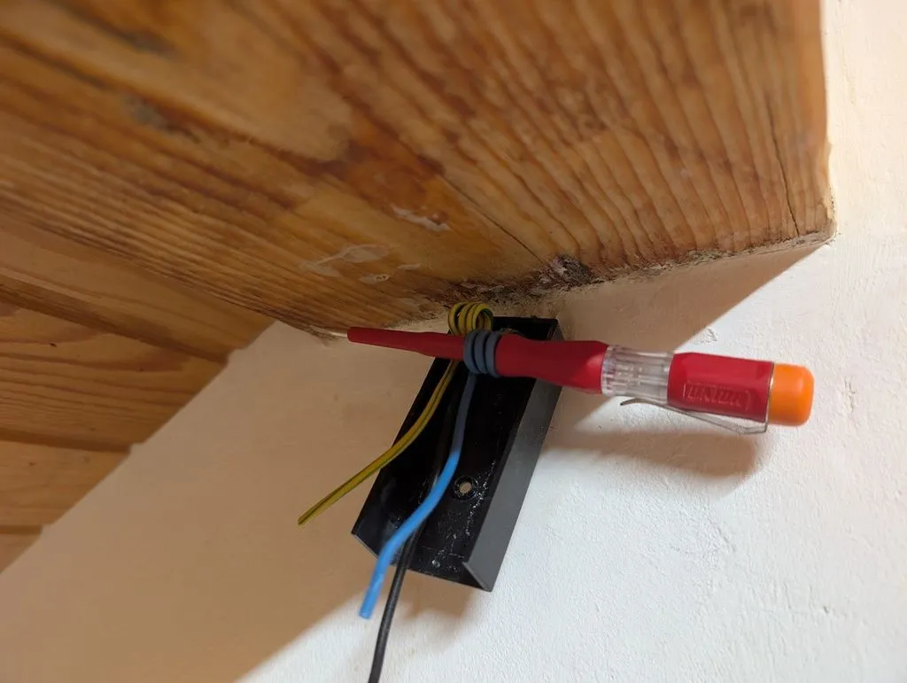 Adding a service loop to the wire (the loop gives some extra length in case of future maintenance or rewiring).