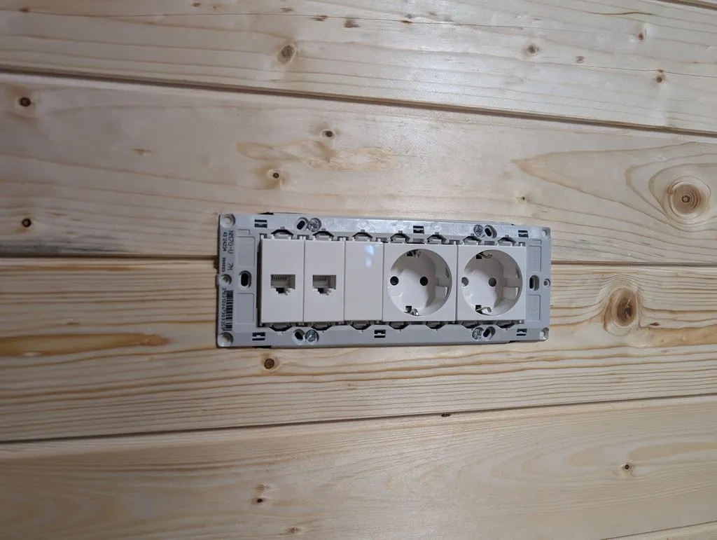 The Ethernet jacks use the same modular click-in system as the outlets and switches, so outlets and Ethernet jacks can live in the same electrical box.