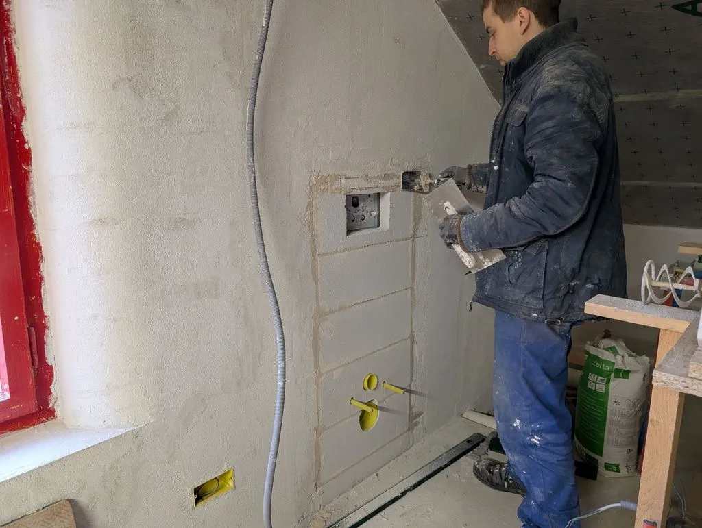 Finishing off the edges around the walled-off frame.