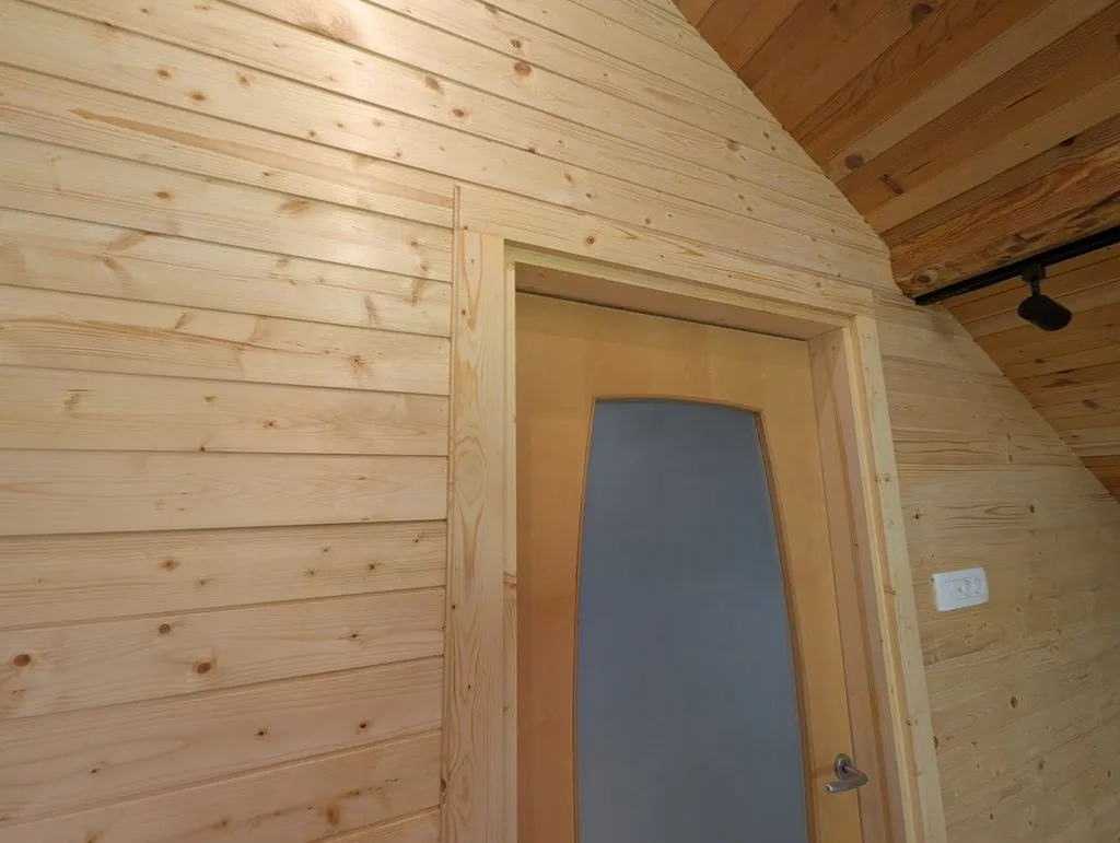 The completed casing on the entry door after finishing with linseed oil.