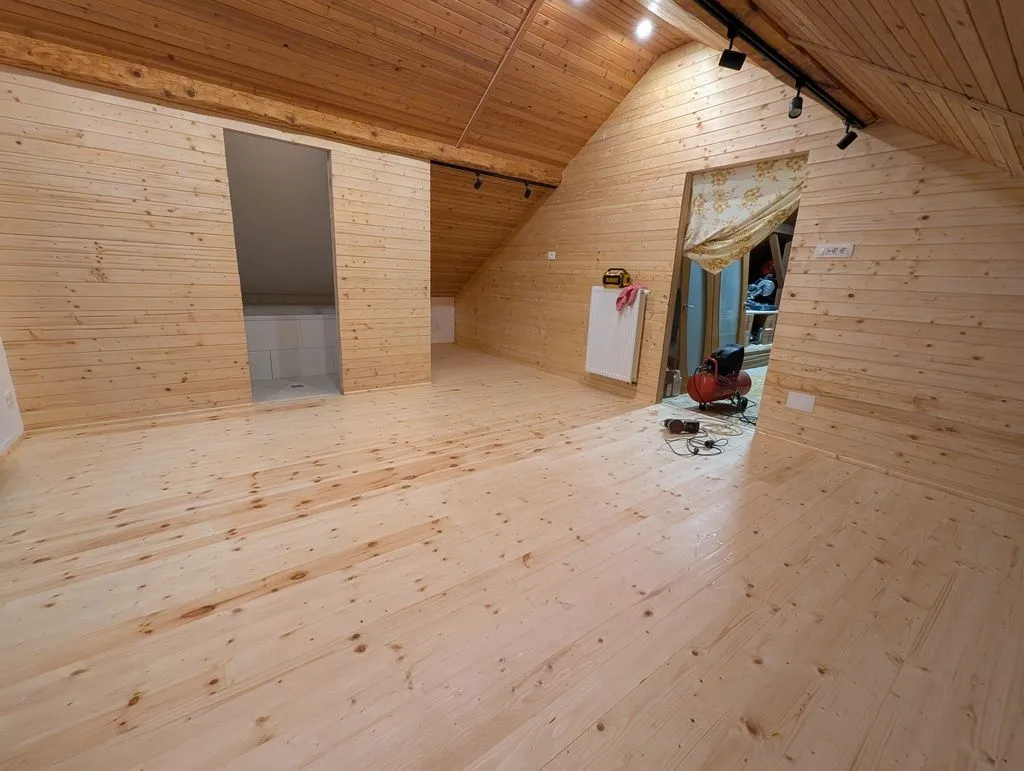 The complete finished floor after intermediate sanding and another coat of finish.