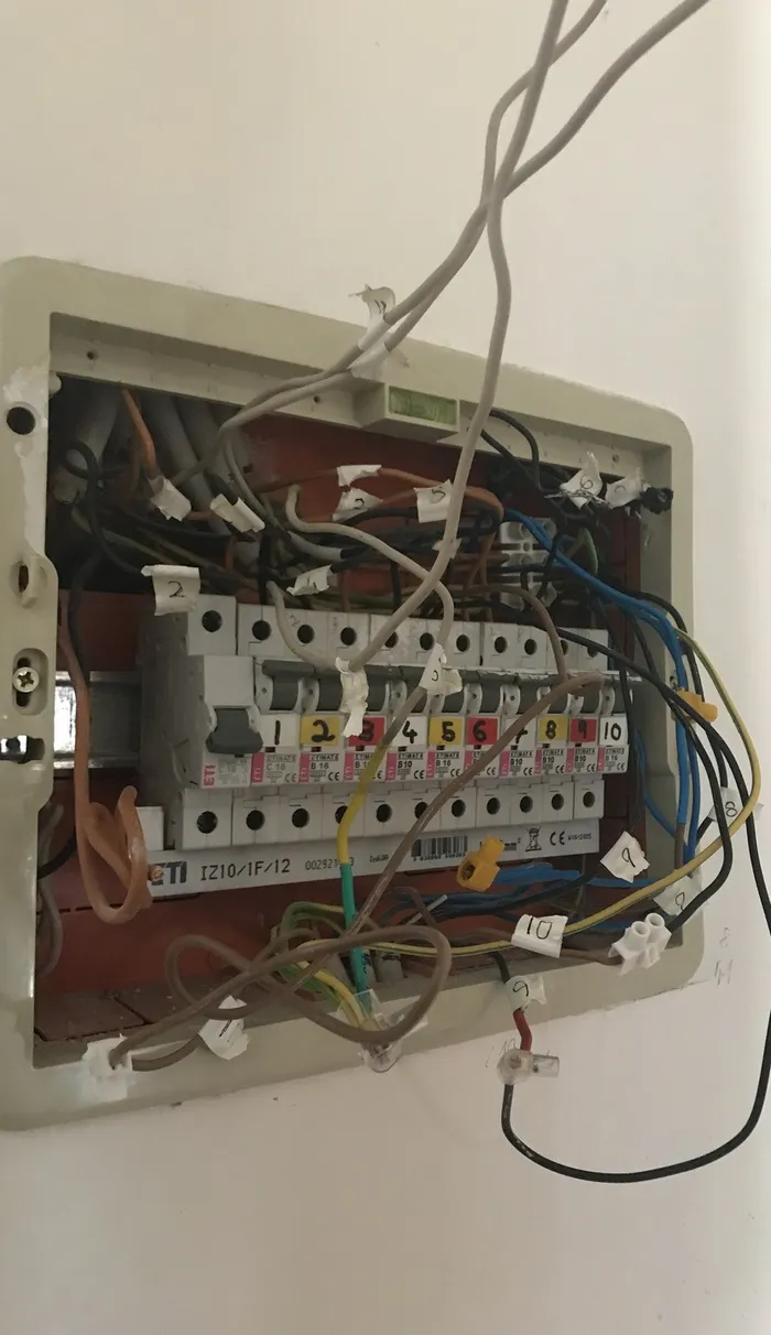 Labels placed on the original wires with electrical tape.